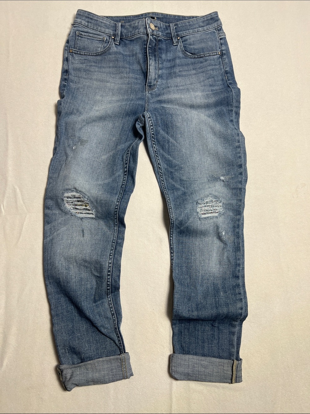 White House Black Market women’s Distressed Light Blue Jeans